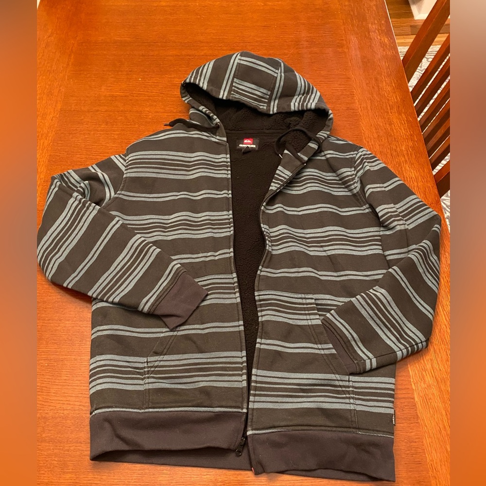 Quicksilver fleece-lined hooded jacket. Black with pale green stripes